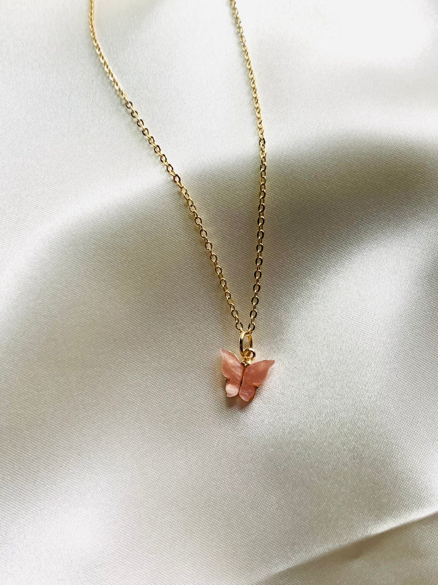 Pink butterfly necklace